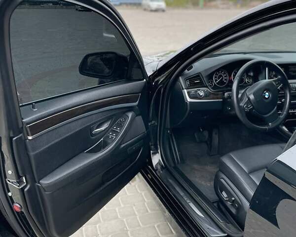 Черный БМВ 5 Серия, объемом двигателя 2 л и пробегом 175 тыс. км за 13900 $, фото 16 на Automoto.ua