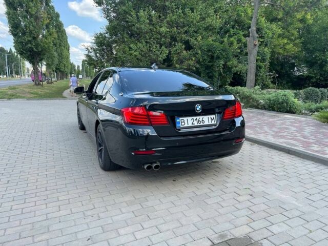 Чорний БМВ 5 Серія, об'ємом двигуна 2 л та пробігом 220 тис. км за 13399 $, фото 1 на Automoto.ua