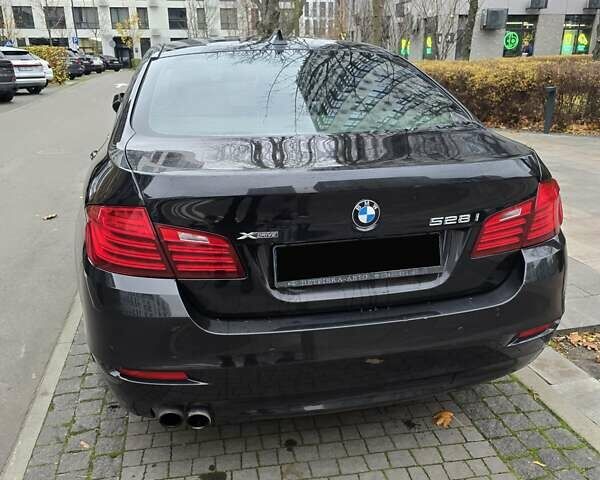 Чорний БМВ 5 Серія, об'ємом двигуна 2 л та пробігом 177 тис. км за 18100 $, фото 2 на Automoto.ua