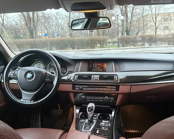 Черный БМВ 5 Серия, объемом двигателя 2 л и пробегом 195 тыс. км за 19500 $, фото 1 на Automoto.ua