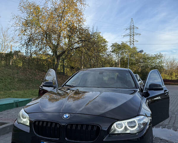 Черный БМВ 5 Серия, объемом двигателя 2 л и пробегом 188 тыс. км за 15000 $, фото 1 на Automoto.ua