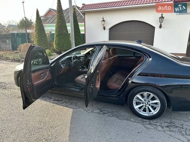 Черный БМВ 5 Серия, объемом двигателя 2 л и пробегом 167 тыс. км за 16499 $, фото 1 на Automoto.ua