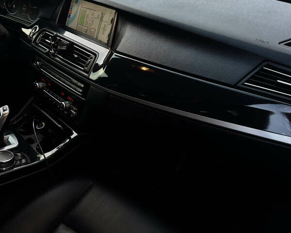 Черный БМВ 5 Серия, объемом двигателя 2 л и пробегом 209 тыс. км за 20000 $, фото 9 на Automoto.ua