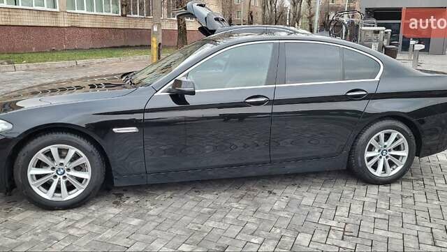 Черный БМВ 5 Серия, объемом двигателя 2 л и пробегом 85 тыс. км за 19000 $, фото 1 на Automoto.ua