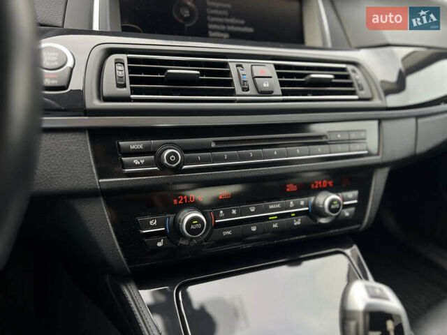 Черный БМВ 5 Серия, объемом двигателя 2 л и пробегом 105 тыс. км за 21300 $, фото 32 на Automoto.ua