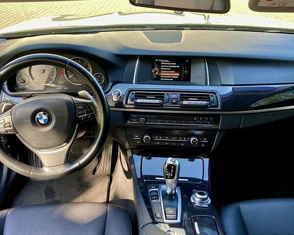 Черный БМВ 5 Серия, объемом двигателя 2 л и пробегом 187 тыс. км за 14900 $, фото 1 на Automoto.ua