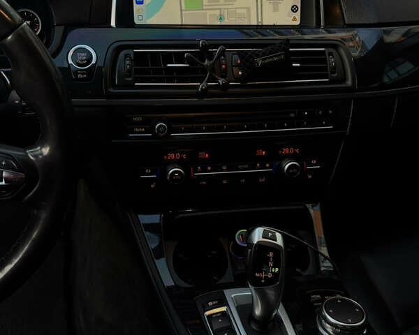 Черный БМВ 5 Серия, объемом двигателя 2 л и пробегом 209 тыс. км за 20000 $, фото 4 на Automoto.ua