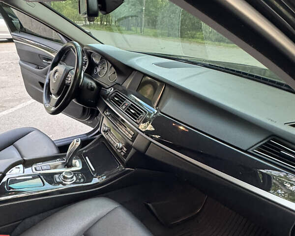 Черный БМВ 5 Серия, объемом двигателя 2 л и пробегом 167 тыс. км за 18000 $, фото 14 на Automoto.ua