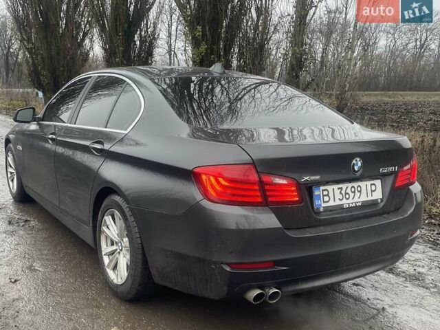 Черный БМВ 5 Серия, объемом двигателя 2 л и пробегом 121 тыс. км за 19500 $, фото 5 на Automoto.ua