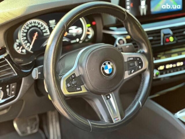 Черный БМВ 5 Серия, объемом двигателя 2 л и пробегом 216 тыс. км за 29490 $, фото 22 на Automoto.ua