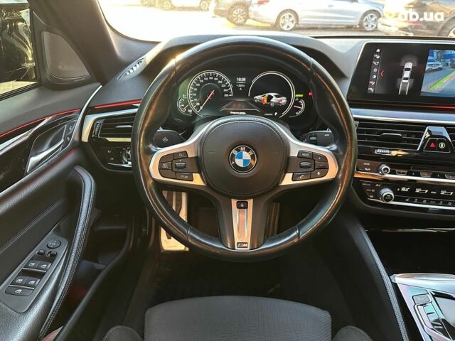 Черный БМВ 5 Серия, объемом двигателя 2 л и пробегом 216 тыс. км за 29490 $, фото 25 на Automoto.ua