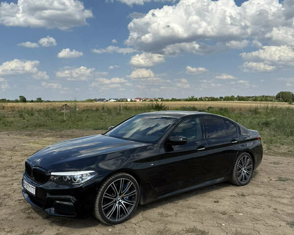 Черный БМВ 5 Серия, объемом двигателя 3 л и пробегом 105 тыс. км за 34700 $, фото 1 на Automoto.ua