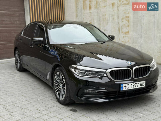 Черный БМВ 5 Серия, объемом двигателя 2 л и пробегом 188 тыс. км за 27499 $, фото 1 на Automoto.ua
