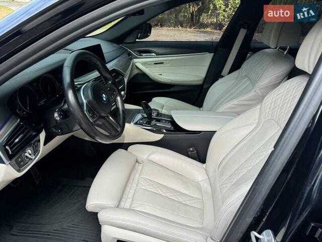 Черный БМВ 5 Серия, объемом двигателя 3 л и пробегом 143 тыс. км за 33000 $, фото 11 на Automoto.ua
