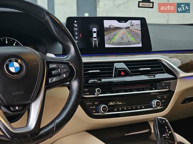 Черный БМВ 5 Серия, объемом двигателя 2 л и пробегом 155 тыс. км за 31500 $, фото 24 на Automoto.ua