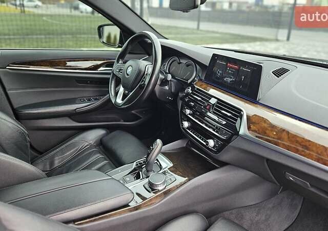 Черный БМВ 5 Серия, объемом двигателя 2 л и пробегом 159 тыс. км за 23499 $, фото 68 на Automoto.ua