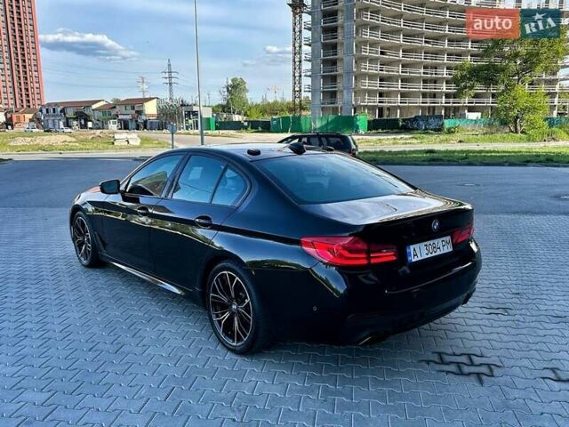 Черный БМВ 5 Серия, объемом двигателя 3 л и пробегом 103 тыс. км за 35000 $, фото 1 на Automoto.ua