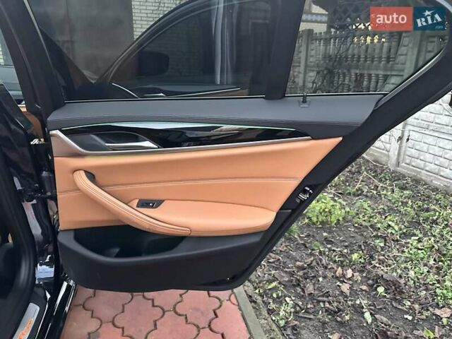 Черный БМВ 5 Серия, объемом двигателя 2 л и пробегом 140 тыс. км за 28590 $, фото 21 на Automoto.ua