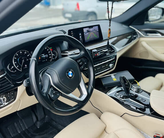 Черный БМВ 5 Серия, объемом двигателя 2 л и пробегом 120 тыс. км за 29999 $, фото 10 на Automoto.ua