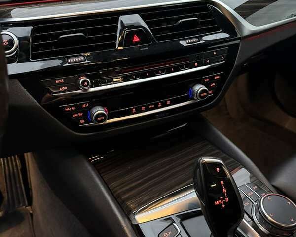 Черный БМВ 5 Серия, объемом двигателя 2 л и пробегом 118 тыс. км за 26890 $, фото 50 на Automoto.ua