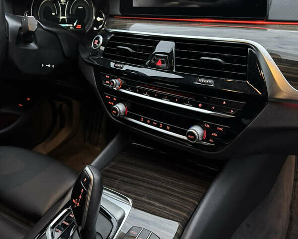 Черный БМВ 5 Серия, объемом двигателя 2 л и пробегом 118 тыс. км за 26890 $, фото 26 на Automoto.ua