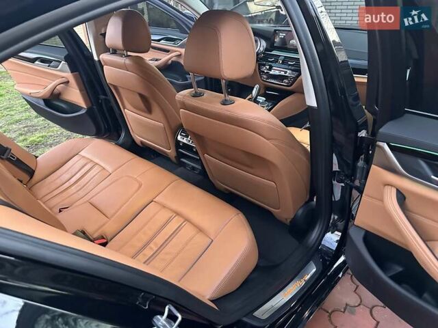 Черный БМВ 5 Серия, объемом двигателя 2 л и пробегом 140 тыс. км за 28590 $, фото 24 на Automoto.ua