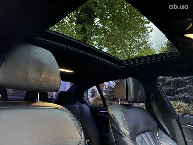 Чорний БМВ 5 Серія, об'ємом двигуна 2 л та пробігом 82 тис. км за 35440 $, фото 27 на Automoto.ua