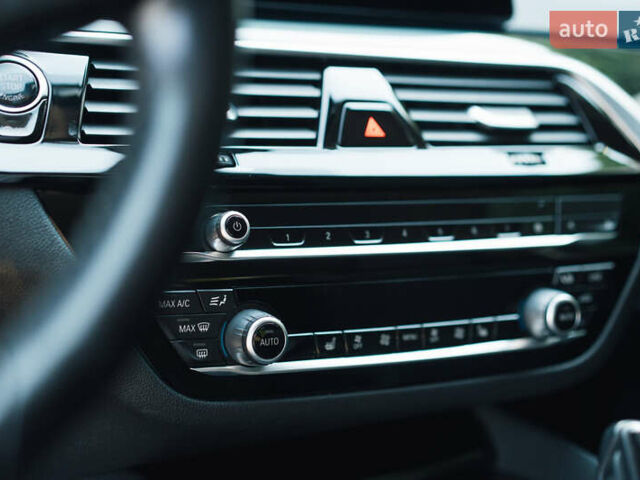 Черный БМВ 5 Серия, объемом двигателя 2 л и пробегом 155 тыс. км за 37500 $, фото 21 на Automoto.ua