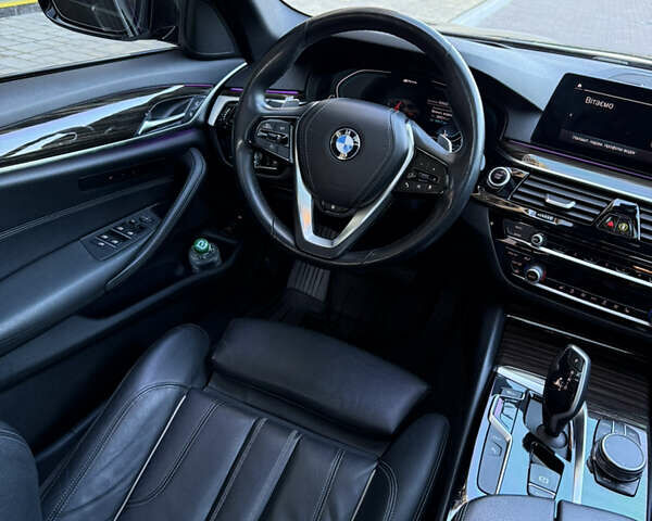 Черный БМВ 5 Серия, объемом двигателя 2 л и пробегом 110 тыс. км за 34990 $, фото 18 на Automoto.ua