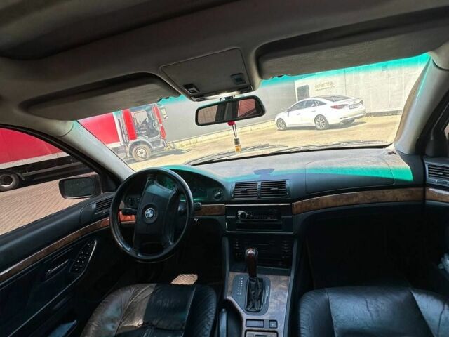 Черный БМВ 5 Серия, объемом двигателя 2.5 л и пробегом 200 тыс. км за 2550 $, фото 4 на Automoto.ua