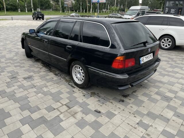 Черный БМВ 5 Серия, объемом двигателя 2.5 л и пробегом 362 тыс. км за 4500 $, фото 1 на Automoto.ua