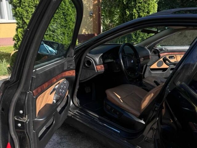 Черный БМВ 5 Серия, объемом двигателя 3 л и пробегом 400 тыс. км за 2222 $, фото 2 на Automoto.ua