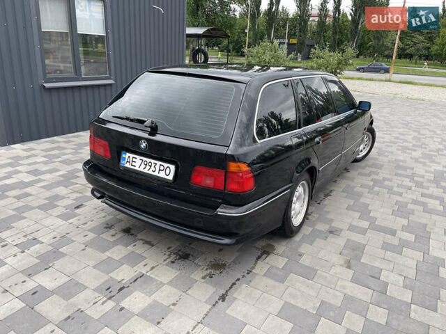 Черный БМВ 5 Серия, объемом двигателя 2.5 л и пробегом 326 тыс. км за 4500 $, фото 1 на Automoto.ua