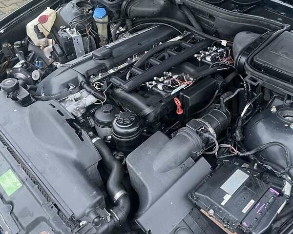 Черный БМВ 5 Серия, объемом двигателя 2.5 л и пробегом 380 тыс. км за 4499 $, фото 7 на Automoto.ua