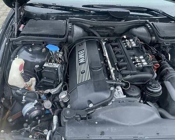 Черный БМВ 5 Серия, объемом двигателя 2.5 л и пробегом 380 тыс. км за 4499 $, фото 6 на Automoto.ua