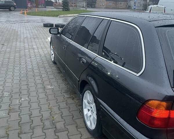 Черный БМВ 5 Серия, объемом двигателя 2.5 л и пробегом 380 тыс. км за 4499 $, фото 1 на Automoto.ua
