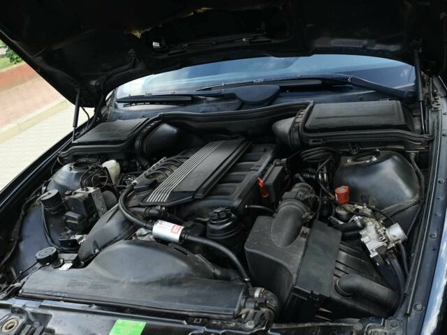 Черный БМВ 5 Серия, объемом двигателя 1.99 л и пробегом 389 тыс. км за 2097 $, фото 7 на Automoto.ua