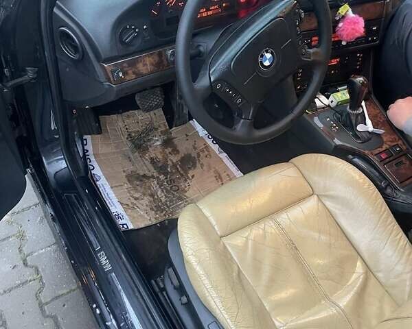 Черный БМВ 5 Серия, объемом двигателя 2.5 л и пробегом 380 тыс. км за 4499 $, фото 10 на Automoto.ua