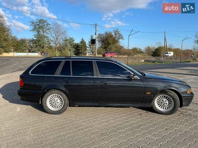 Черный БМВ 5 Серия, объемом двигателя 2.5 л и пробегом 314 тыс. км за 5500 $, фото 1 на Automoto.ua