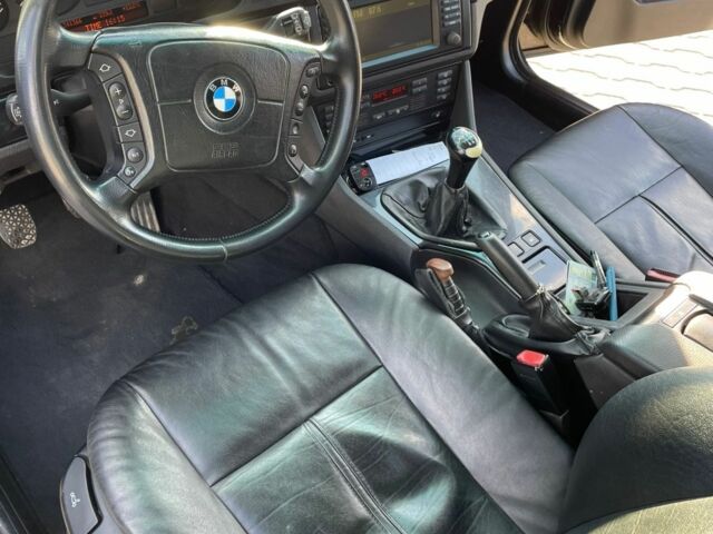 Черный БМВ 5 Серия, объемом двигателя 2.5 л и пробегом 314 тыс. км за 5500 $, фото 1 на Automoto.ua