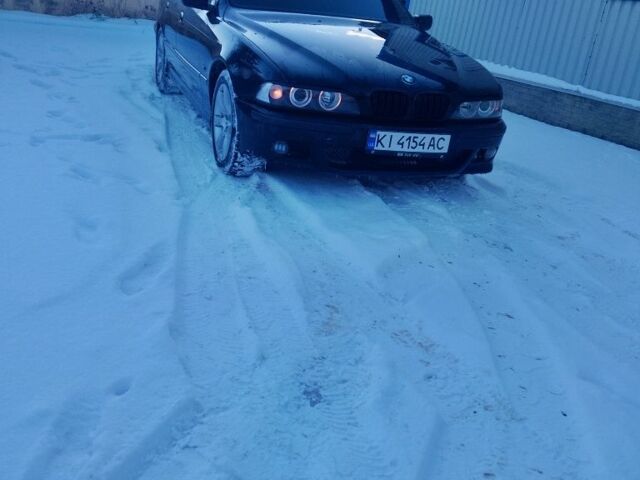 Черный БМВ 5 Серия, объемом двигателя 2.5 л и пробегом 450 тыс. км за 4655 $, фото 1 на Automoto.ua