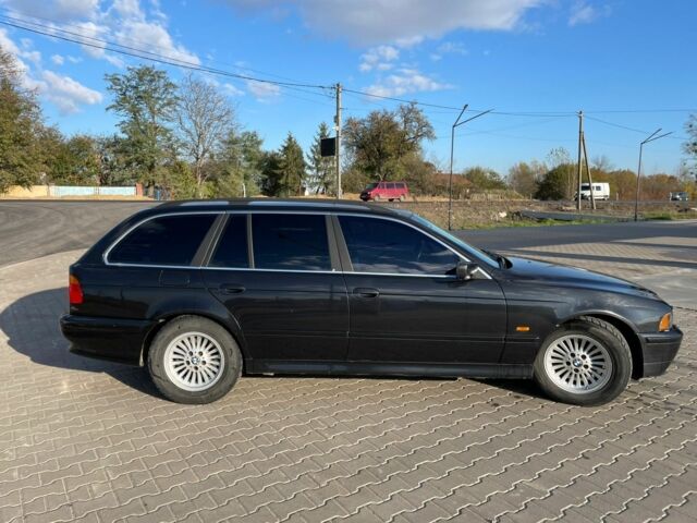 Черный БМВ 5 Серия, объемом двигателя 2.5 л и пробегом 314 тыс. км за 5500 $, фото 2 на Automoto.ua