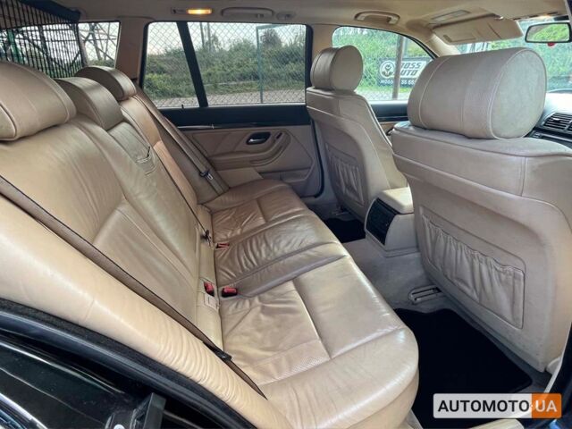 Черный БМВ 5 Серия, объемом двигателя 2 л и пробегом 213 тыс. км за 5250 $, фото 16 на Automoto.ua