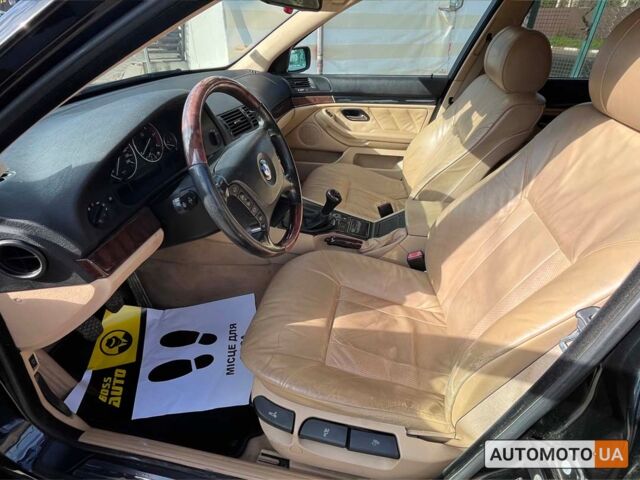 Черный БМВ 5 Серия, объемом двигателя 2 л и пробегом 213 тыс. км за 5250 $, фото 9 на Automoto.ua