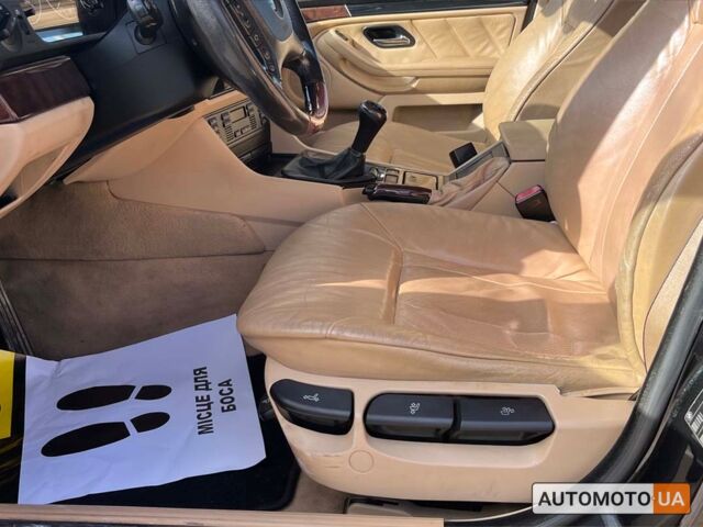 Черный БМВ 5 Серия, объемом двигателя 2 л и пробегом 213 тыс. км за 5250 $, фото 10 на Automoto.ua