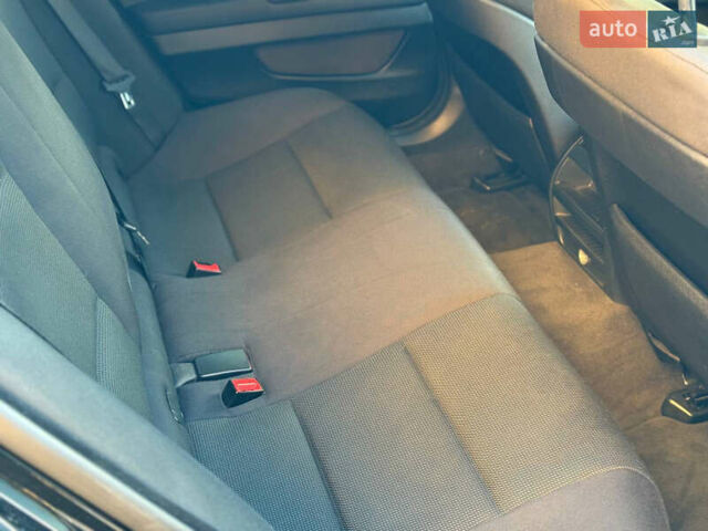 Черный БМВ 5 Серия, объемом двигателя 2 л и пробегом 350 тыс. км за 9799 $, фото 9 на Automoto.ua