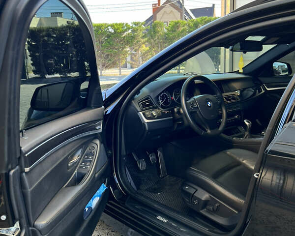 Черный БМВ 5 Серия, объемом двигателя 2 л и пробегом 249 тыс. км за 17706 $, фото 19 на Automoto.ua