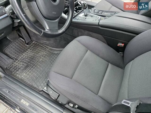 Черный БМВ 5 Серия, объемом двигателя 2 л и пробегом 277 тыс. км за 13777 $, фото 19 на Automoto.ua