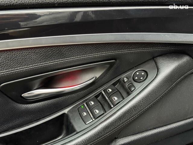 Черный БМВ 5 Серия, объемом двигателя 2 л и пробегом 307 тыс. км за 14490 $, фото 14 на Automoto.ua