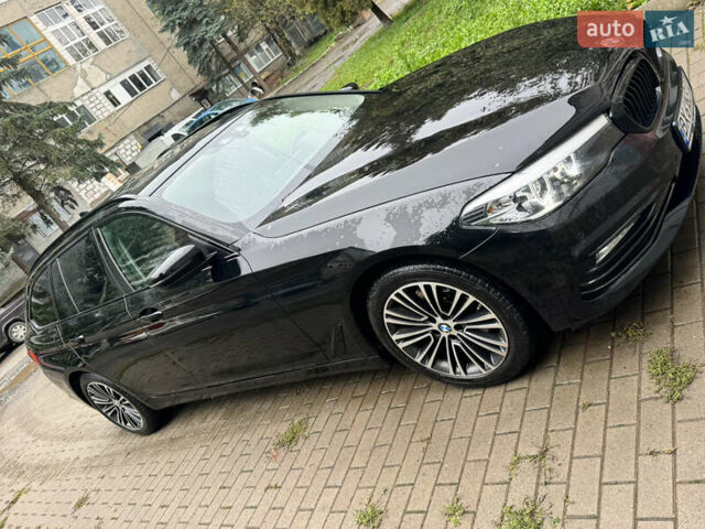 Чорний БМВ 5 Серія, об'ємом двигуна 2 л та пробігом 294 тис. км за 23999 $, фото 1 на Automoto.ua